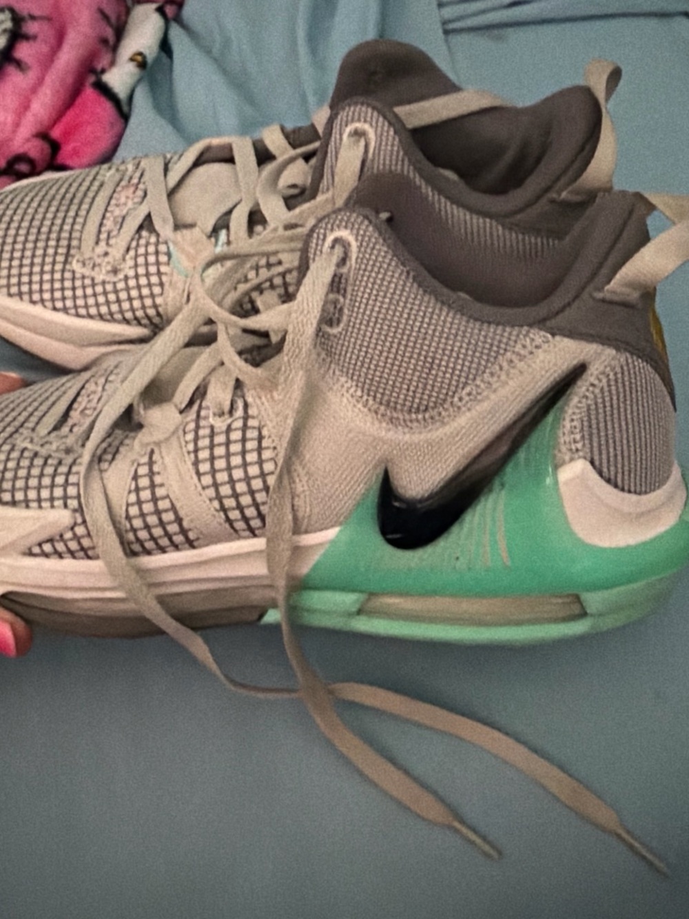 Nike Women's Gray Mesh Athletic Shoes with Mint Green Heel Accent